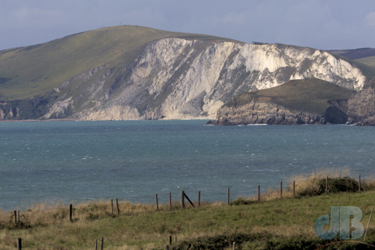 Edge of Lulworth Cove from cliffs beyond Kimmeridge Bay