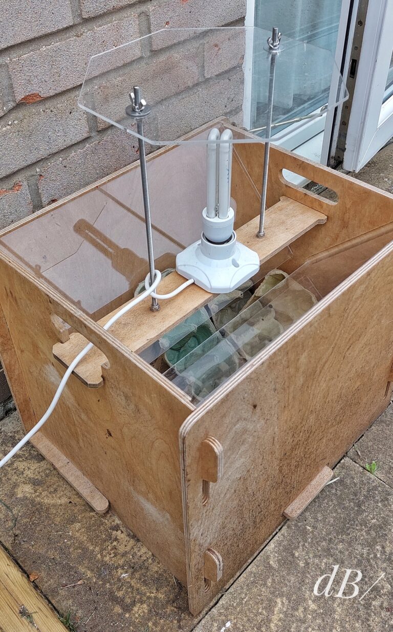 A collapsible Skinner moth trap with 20W Wemlite, UV bulb, and rain guard