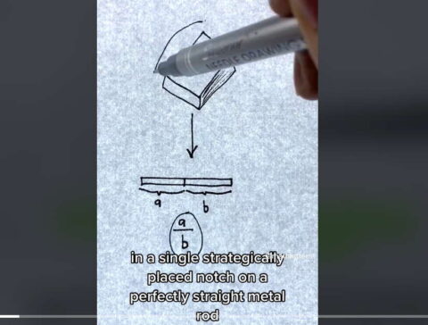 Screen grab from the video showing a pen drawing a notch with a ratio of a:b